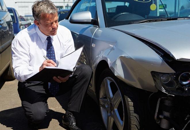 car insurance agent discussing policy options with customer